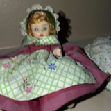 Collection of Vintage Dolls in Decorative Dresses - thumbnail 6 of 9