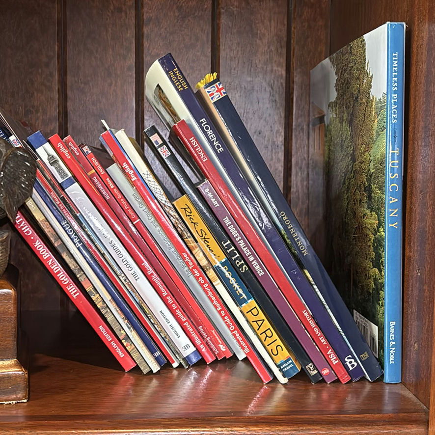 Books, Elephant Figurines, and Speaker on Wooden Bookshelf - image 4 of 17