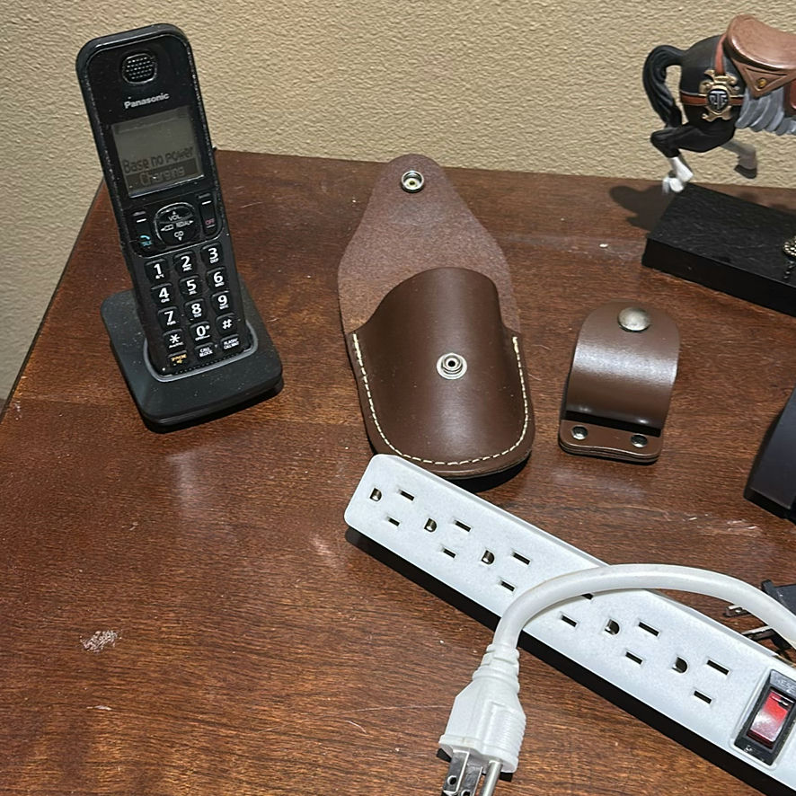 Panasonic Cordless Phone, Timex Clock Radio, Carousel Horse Figurine, Leather Holders, and Power Strip - image 2 of 6