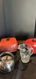 Red Cast Iron Cookware, Stainless Steel Kettle, and Glass Pitcher - thumbnail 1 of 6