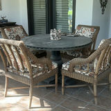 Round Dining Table with Four Wicker Chairs and Decorative Sculptures - thumbnail 5 of 7