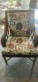Round Dining Table with Four Wicker Chairs and Decorative Sculptures - thumbnail 1 of 7
