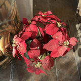 Decorative Ceramic Snowman Containers, Metal Garden Stool, and Artificial Poinsettia Arrangements - thumbnail 4 of 5