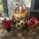 Decorative Ceramic Snowman Containers, Metal Garden Stool, and Artificial Poinsettia Arrangements - thumbnail 1 of 5