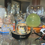 Collection of Travel Souvenir Snow Globes and Glass Angel Figurines - thumbnail 2 of 8