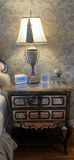 Mirrored Nightstand with Table Lamp, Clocks, and Decorative Globe - thumbnail 1 of 8