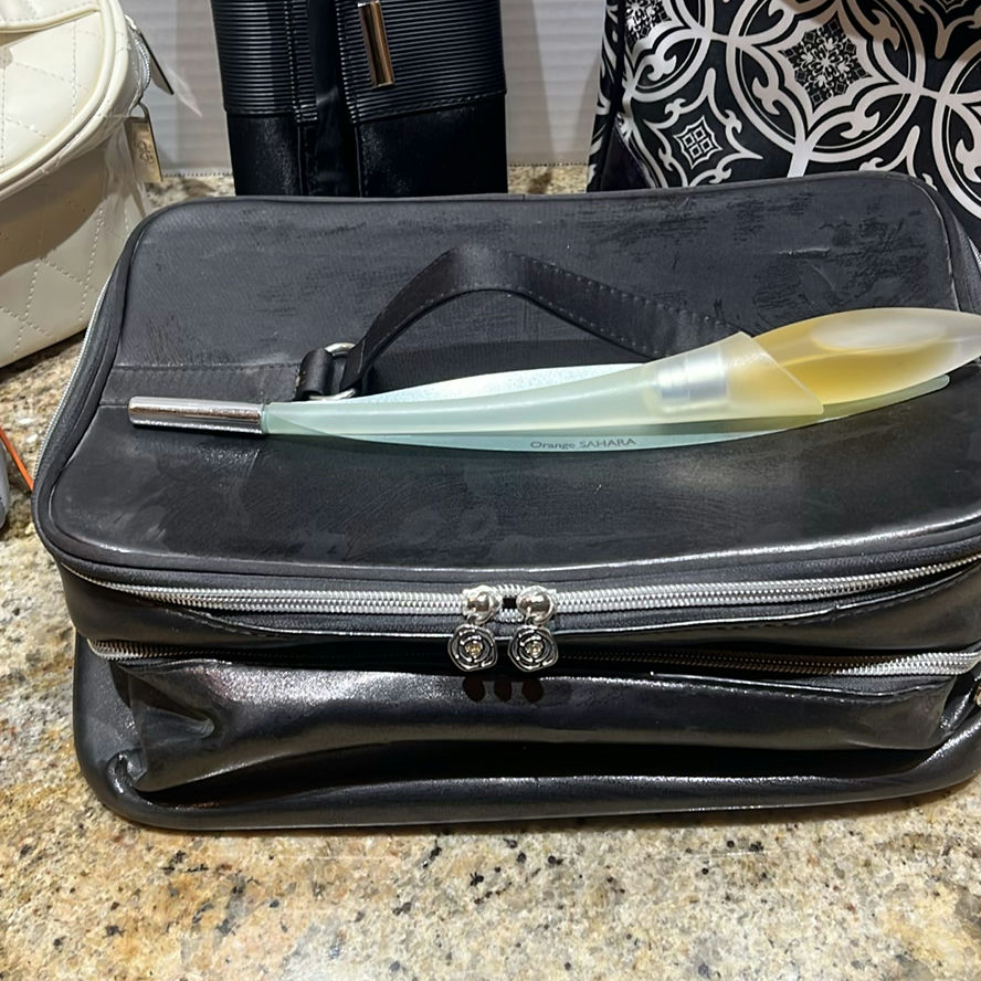 Assorted Cosmetic and Travel Bags with Fragrance Bottle - image 2 of 13