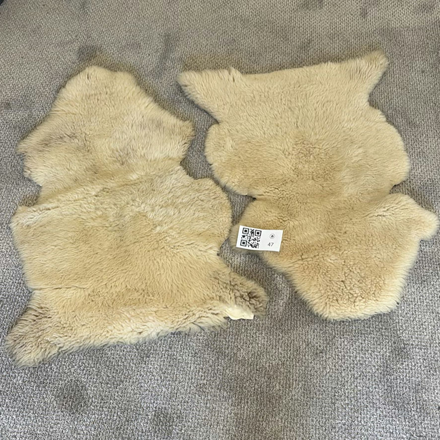 Pair of Natural Sheepskin Rugs - image 1 of 9