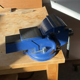 Wood Workbench with Bench Vise and Lumber - thumbnail 2 of 9