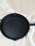 Cast iron skillet with blue silicone handle - thumbnail 3 of 5