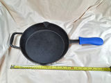 Cast iron skillet with blue silicone handle - thumbnail 1 of 5