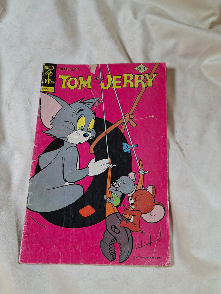 Vintage Tom and Jerry comics with retro ads and posters - image 1 of 5