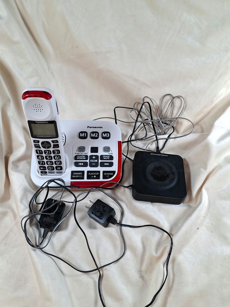 Panasonic cordless phone with base station and Grandstream device - image 1 of 5