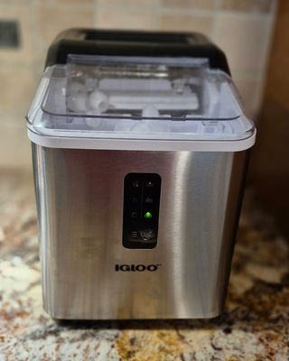 Igloo countertop ice maker with ice cubes - Image 1 of 2
