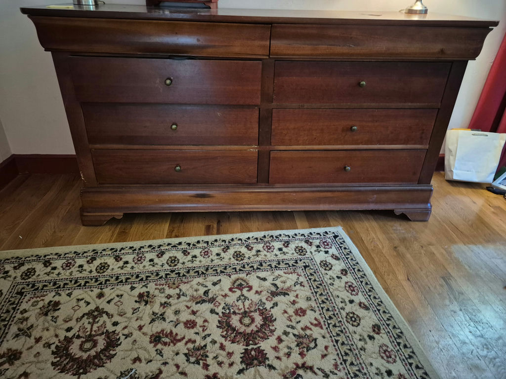 Eight-drawer dark wood dresser - image 1 of 2