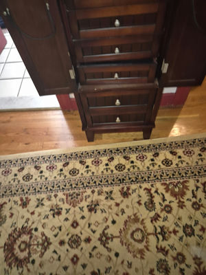 Dark wood jewelry armoire with multiple drawers - Image 1 of 6