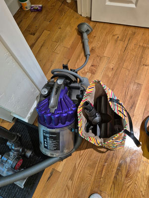Dyson vacuum with hose and accessories - Image 1 of 3