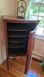 Antique curved-front wooden cabinet with carved panel - thumbnail 3 of 3
