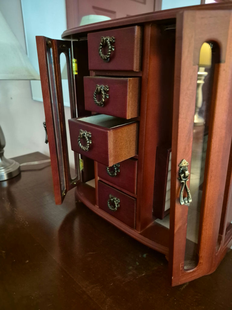 Small wooden jewelry armoire with mirrored doors and five drawers - image 3 of 3