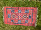 Handwoven cotton rug with geometric red and blue pattern - thumbnail 1 of 5