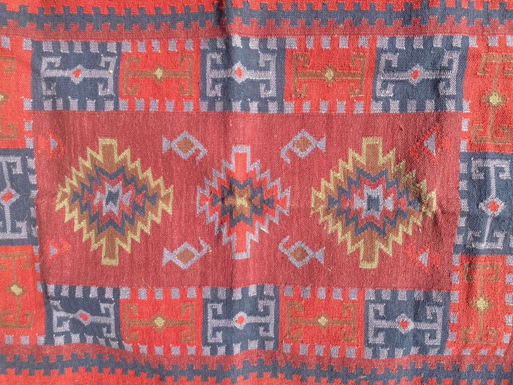 Handwoven cotton rug with geometric red and blue pattern - image 4 of 5