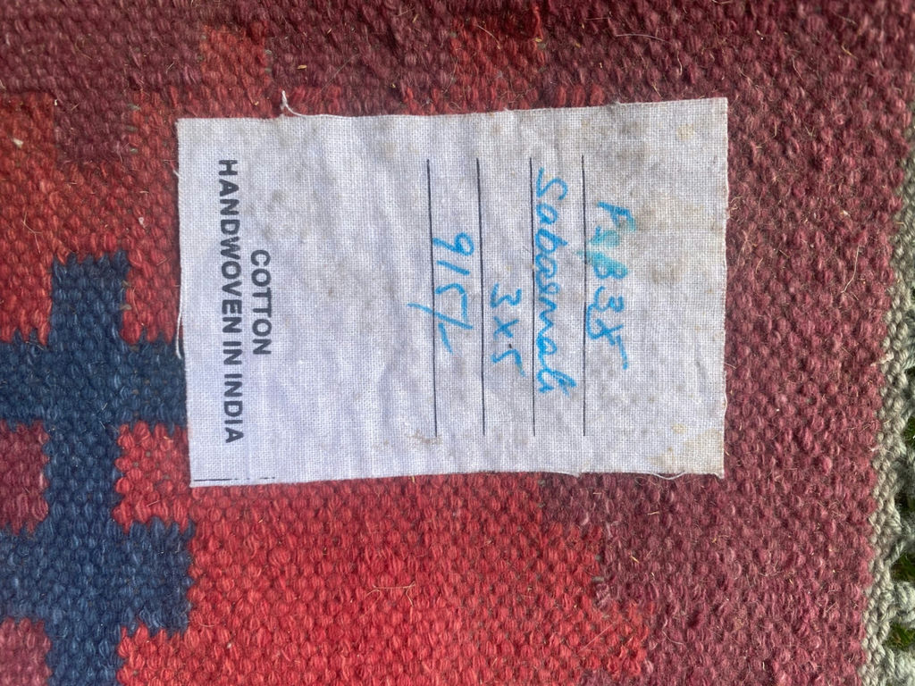 Handwoven cotton rug with geometric red and blue pattern - image 2 of 5