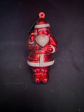 Vintage, metallic-red hard plastic Santa Claus Christmas tree ornament - thumbnail 1 of 3