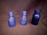 Vintage cobalt blue glass medicine bottles - thumbnail 1 of 1