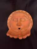 Terracotta sun face wall hanging/bird feeder - thumbnail 1 of 3