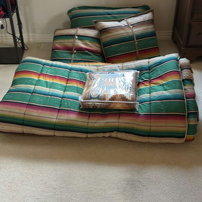Striped floor cushions with packaged fleece blanket - Image 1 of 5