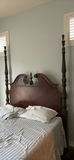 Dark wood four-poster bed with ornate headboard - thumbnail 3 of 7