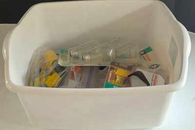 Plastic Storage Bin with Assorted Light Bulbs and Accessories - Image 1 of 5