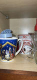 Assorted glassware and mugs on cabinet shelf - thumbnail 4 of 5