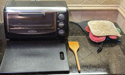 BLACK & DECKER Toast-R-Oven with Cutting Board, Wooden Spatula, and Oven Mitts - Image 1 of 6