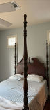 Dark wood four-poster bed with ornate headboard - thumbnail 2 of 7