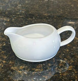 Assorted Ceramic Teacups, Saucers, and Mugs - thumbnail 7 of 8
