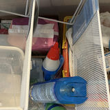 Clear plastic storage tote with cleaning supplies and miscellaneous items - thumbnail 3 of 4