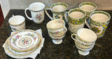 Assorted Ceramic Teacups, Saucers, and Mugs - thumbnail 1 of 8