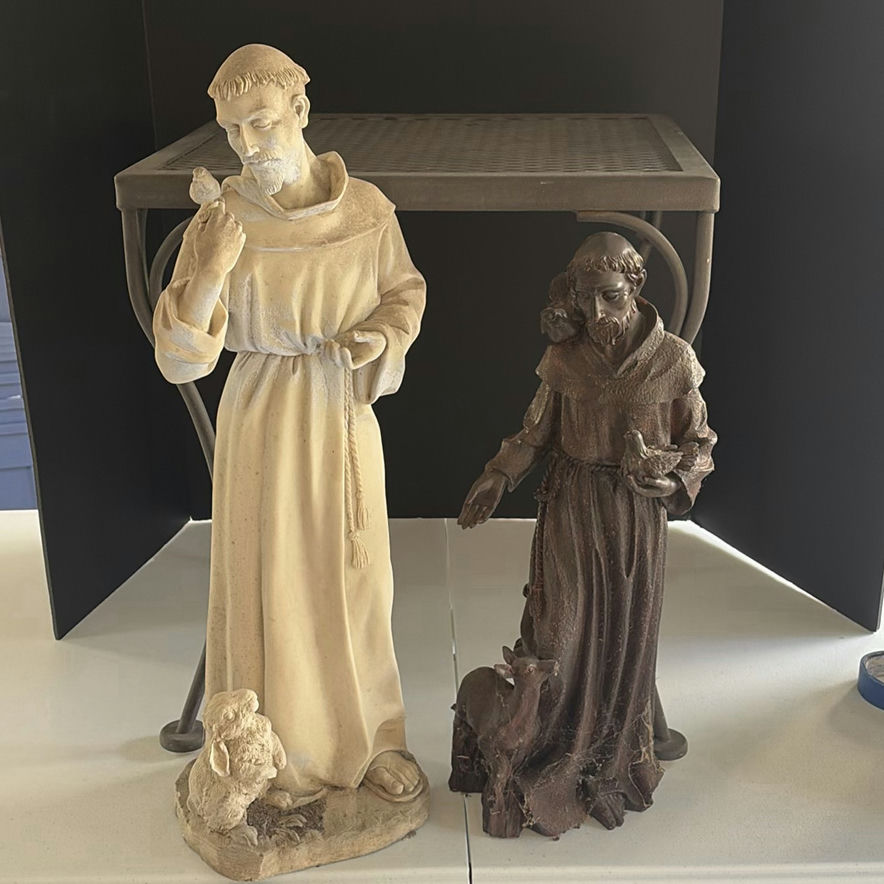 Two Robed Figurine Statues and Metal Mesh Table - image 1 of 5