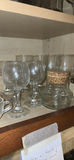 Assorted glassware and mugs on cabinet shelf - thumbnail 2 of 5