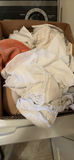 Assorted household items: lighting bulbs and laundry textiles - thumbnail 3 of 4