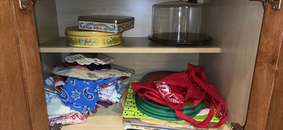 Whitman's Sampler tin, glass cake dome, and textiles - Image 1 of 5