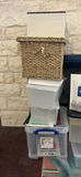 Stacked plastic storage boxes with baskets and organizers - thumbnail 2 of 5