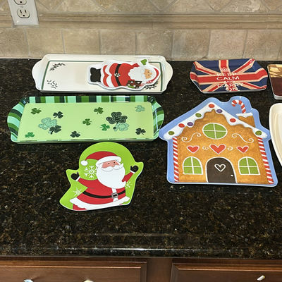 Assorted Decorative Serving Trays, Pot Holders, Oven Mitts, and Trivets - Image 1 of 7