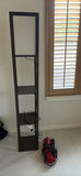 Tall dark wood ladder-style bookshelf with vacuum - thumbnail 1 of 4