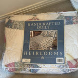 Stack of bedding items: towels, blankets, and a quilt - thumbnail 6 of 6