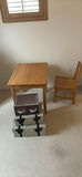 Wooden dining table with chair and stacked storage boxes - thumbnail 1 of 5