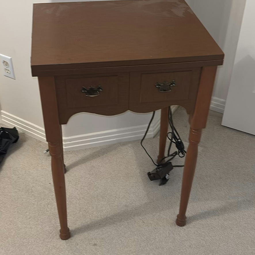 Singer Sewing Machine in Wooden Cabinet Table - image 1 of 4