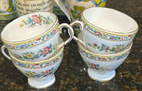 Assorted Ceramic Teacups, Saucers, and Mugs - thumbnail 4 of 8