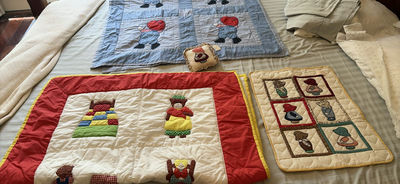 Handmade quilts and decorative pillow with bear appliqué, plus a Playmobil toy box - Image 1 of 9